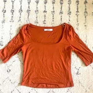 Rust colored crop shirt